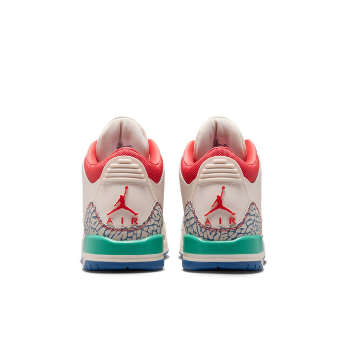 Youth sneakers rear view with red heel tabs, Air logo, teal midsole, and blue outsole