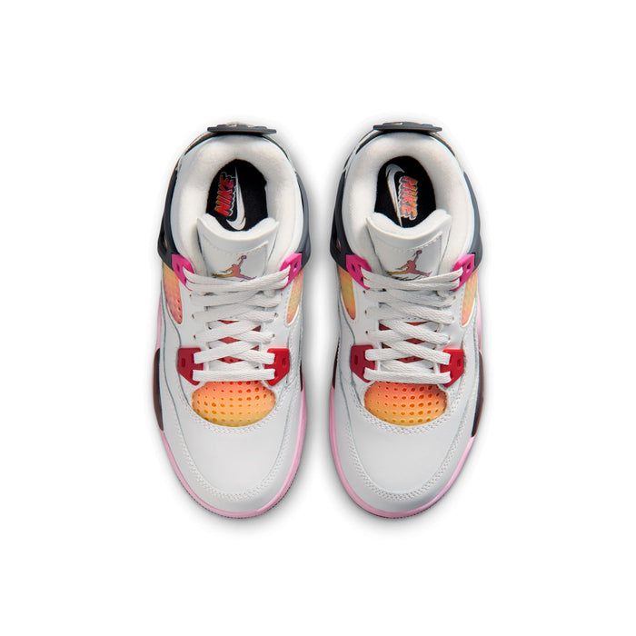 Kids sneakers showing white tongue and laces with pink and multicolor panel inserts