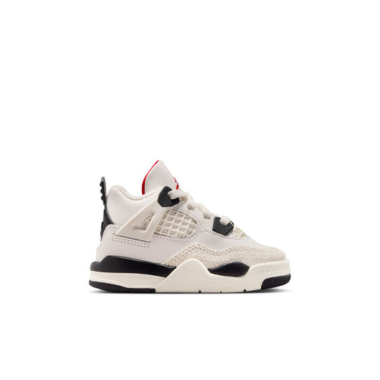 Toddler low-top sneakers in sail white with black accents and red heel lining