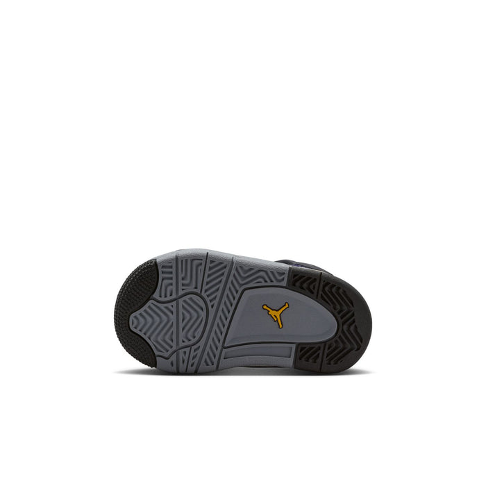 Toddler Retro 4 sneaker outsole, gray tread with yellow Jumpman mark