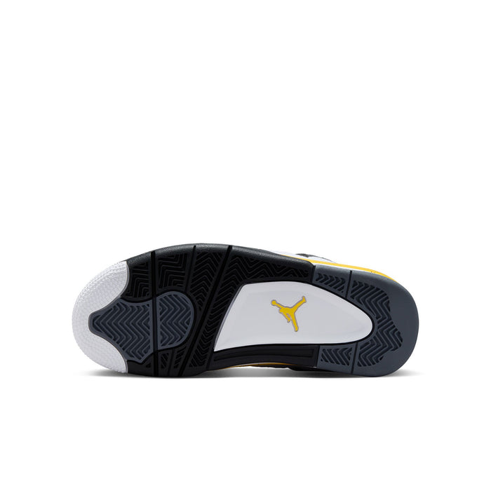 Youth sneaker outsole with dark tread pattern and yellow Jumpman logo on heel.
