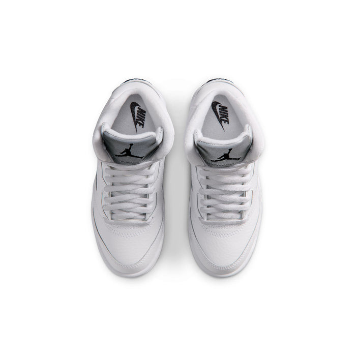 Kids white sneakers, top view with gray lining and black logo on tongue