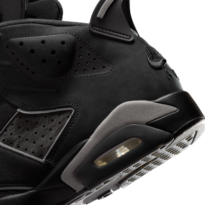 Men's black high-top sneakers, close-up of side panel and air window