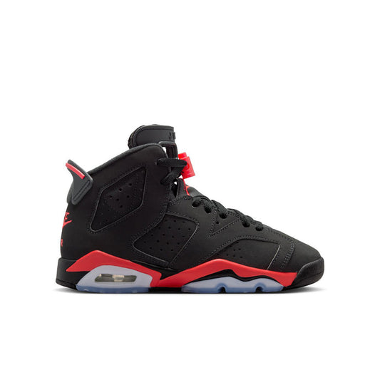Youth Retro 6 sneakers, black high-top with red accents and visible Air window