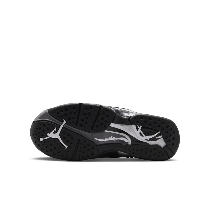 Youth black rubber outsole with tread pattern and silver/white accents