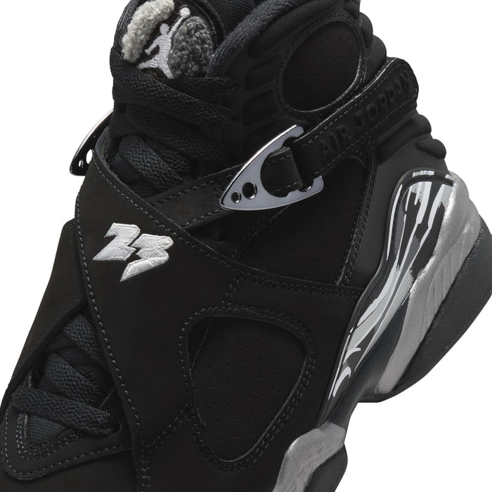 Youth black high-top sneakers with adjustable strap, silver detailing, and Jumpman logo