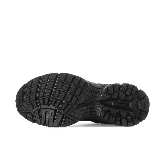 Black women's running shoes, outsole tread view with deep rubber traction pattern