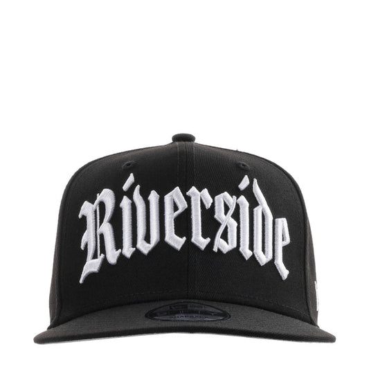 Black snapback cap with white front embroidered logo