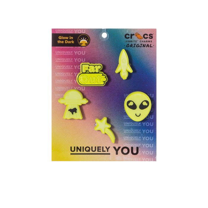 Glow-in-the-dark green rocket and alien Jibbitz charms on retail card