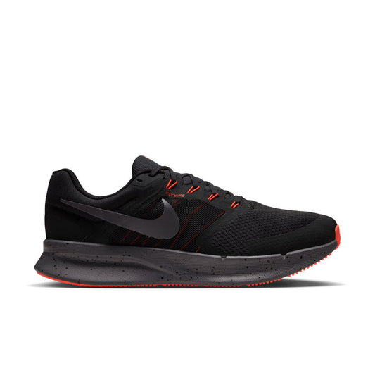 Men's black running shoe with orange-red laces and side Swoosh