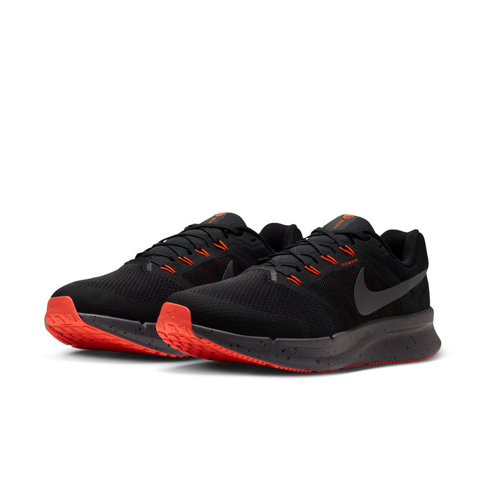 Men's black running shoes pair with orange-red outsole and lace accents