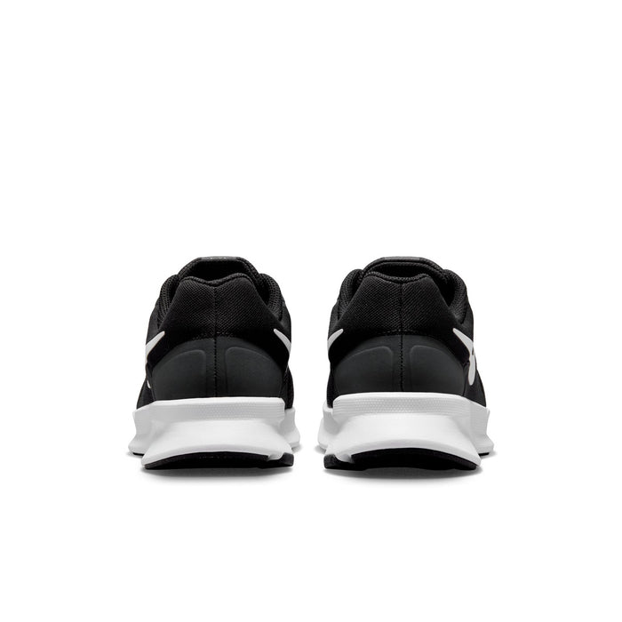Black running shoes heel view with white midsole and cushioned back collar.