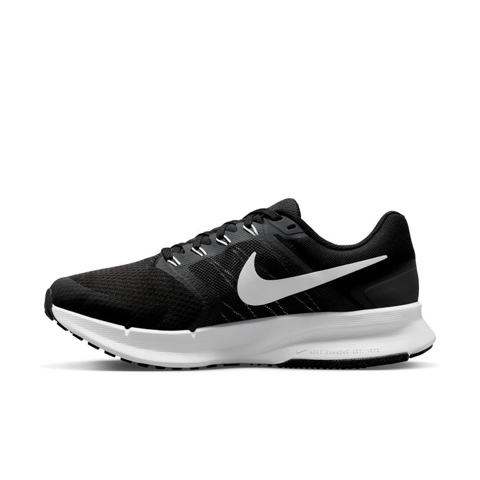 Black mesh running shoe with white Nike swoosh, lace-up front, and white midsole.