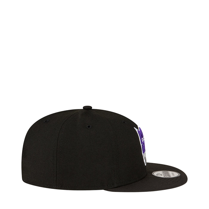 Black snapback baseball cap, side view with partial purple Kings graphic