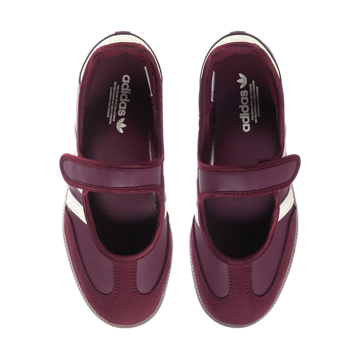 Women's maroon low-top sneaker with Adidas logo on the inside lining