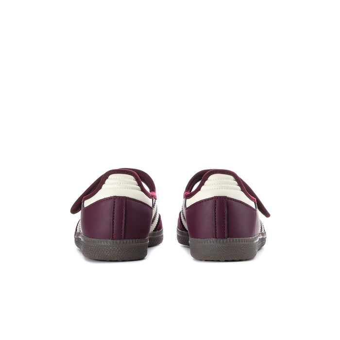 Women's maroon sneaker heel view with cream accents and textured rubber outsole