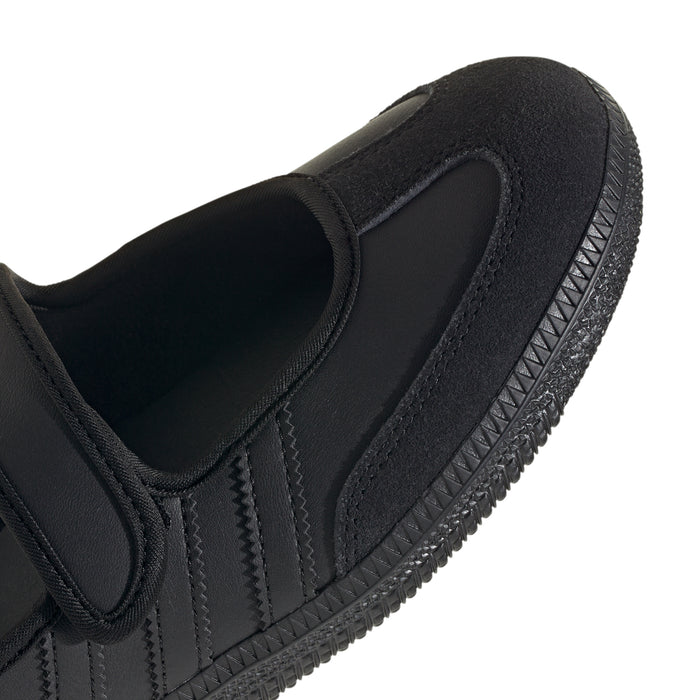 Close-up of black Mary Jane upper with panel seams and padded interior