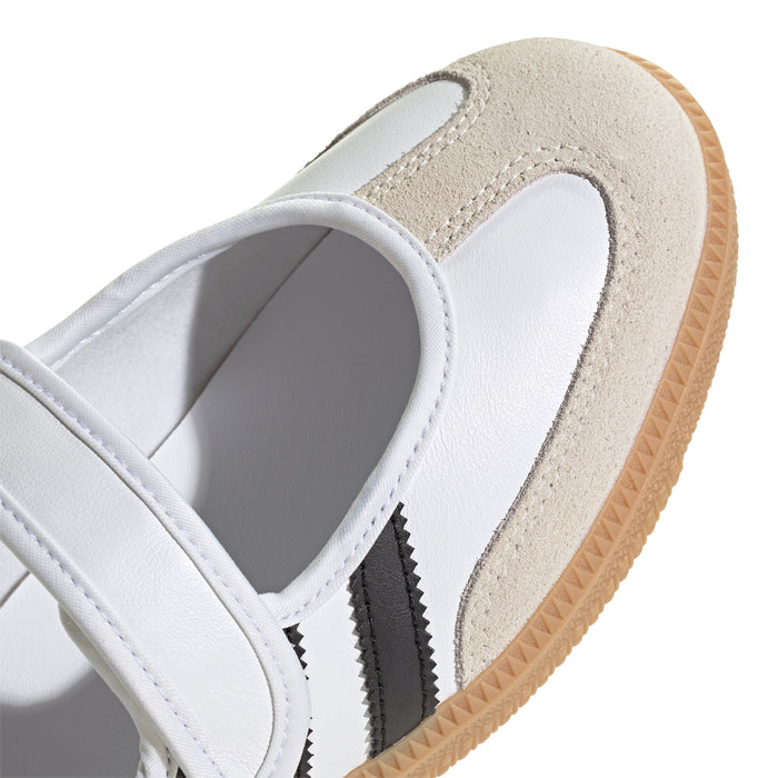 Close-up of white adidas Samba Jane upper with suede beige panel and black stripes