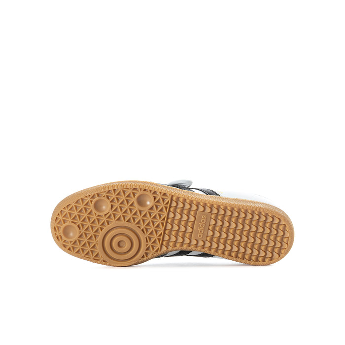 Gum rubber outsole with textured traction and circular grip details