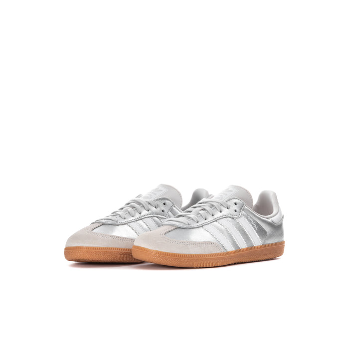 Kids low-top sneakers, white leather upper with silver stripes and gum outsole