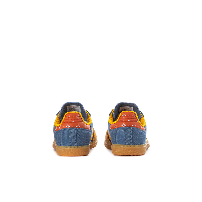 Kids sneakers heel view: blue suede with orange/yellow accents and gum outsole