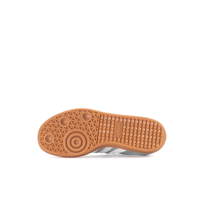 Kids sneaker outsole with textured gum rubber tread and adidas branding