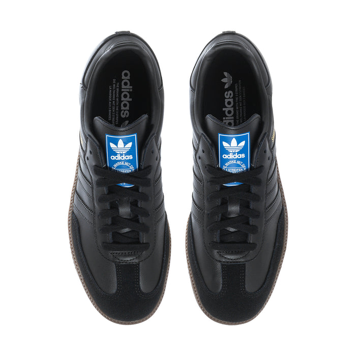Black adidas Samba OG sneakers front view with adidas tongue branding and laces