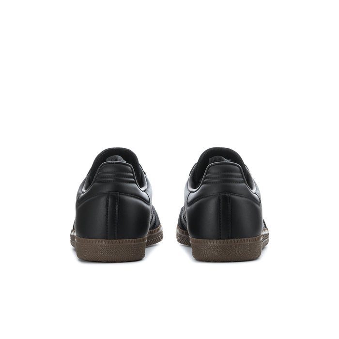 Black adidas Samba OG sneakers with gum-brown rubber outsole, back view