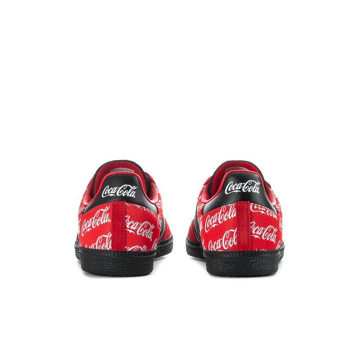 Red and black sneakers with Coca-Cola logo back panels and textured black heel