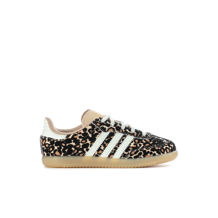Toddler low-top sneaker with leopard print and white adidas stripes, side view