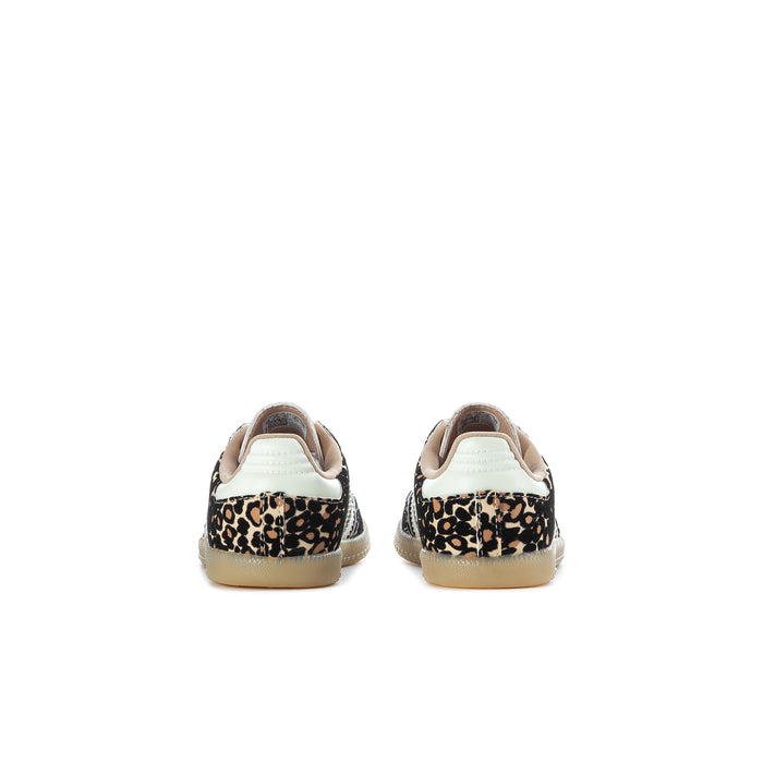 Toddler low-top sneakers with leopard print heel and tan collar, rear view