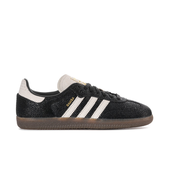Black womens Adidas Samba OG sneaker with white three-stripe detailing and gum sole
