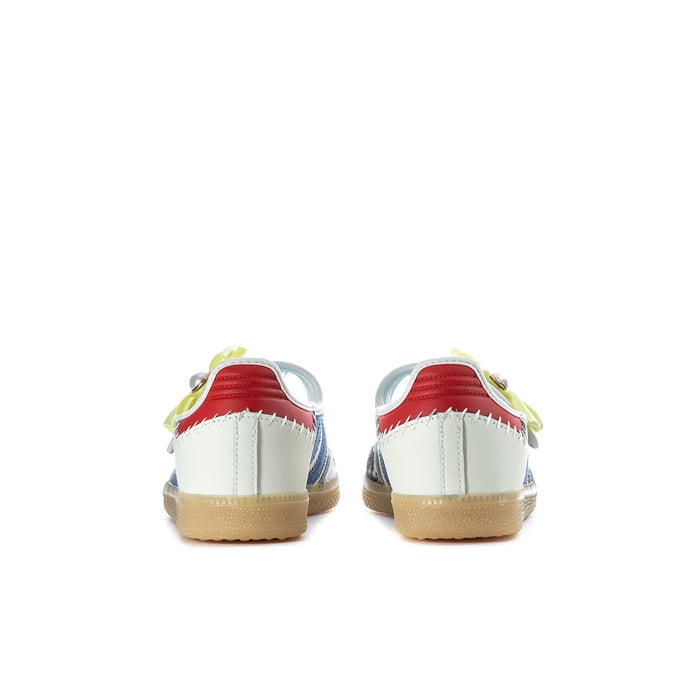 Youth sneaker heel view: cream leather back with red collar lining and gum rubber sole.