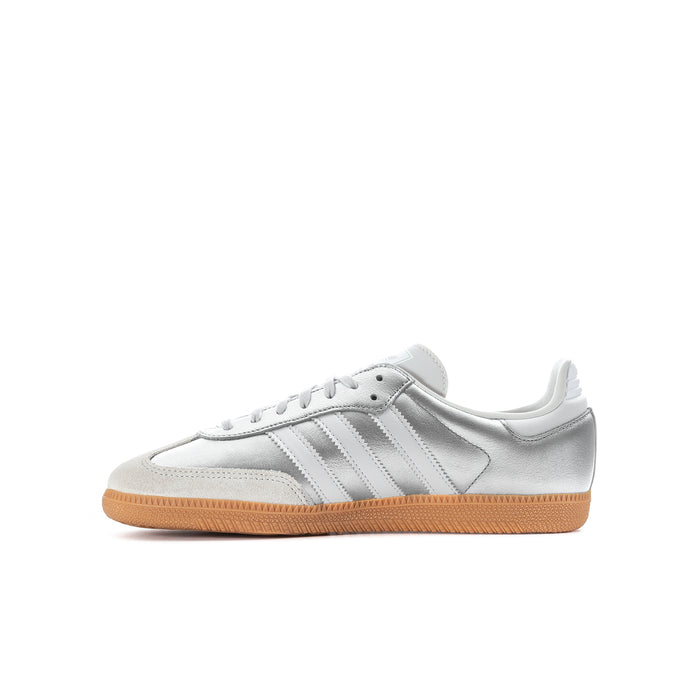 Youth Samba OG sneakers, side profile with metallic silver upper and gum sole