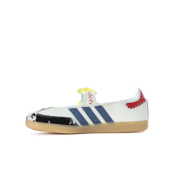 Youth low-top sneaker side view with blue adidas-style stripes, cow-print toe, yellow bow.