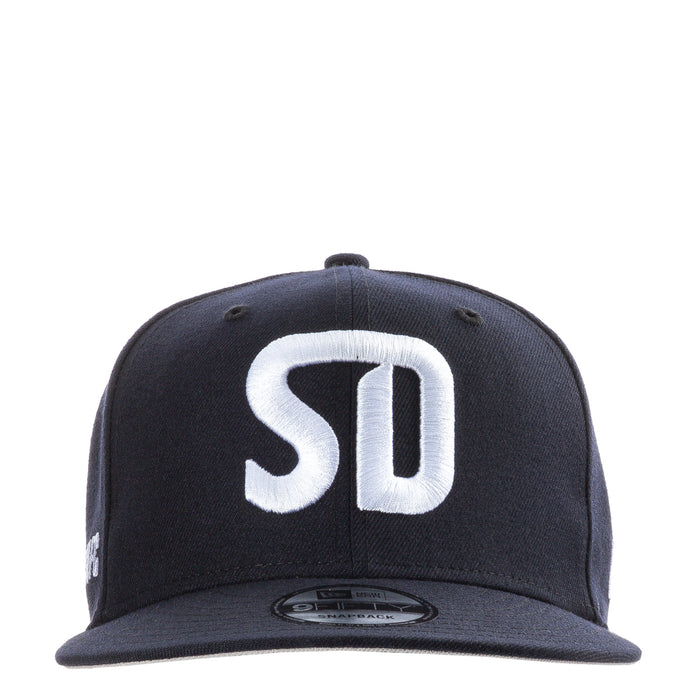 Navy baseball cap with white SD logo on front panel