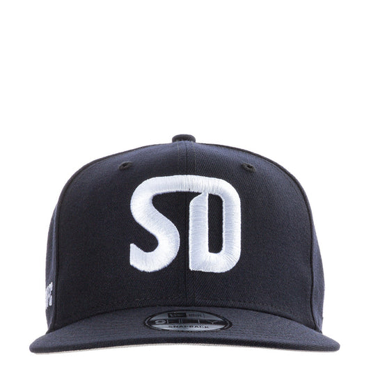 Navy baseball cap with white SD logo on front panel