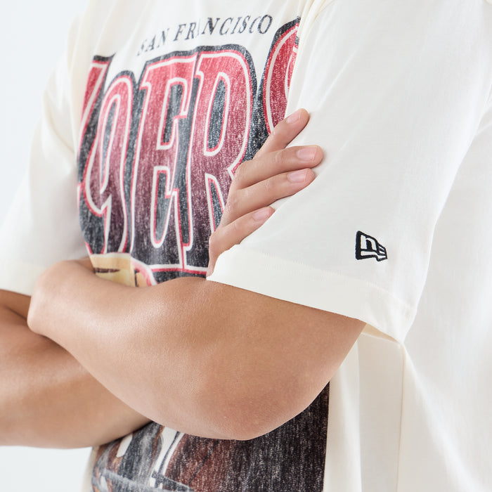 Off-white men’s washed tee with small New Era flag logo on sleeve