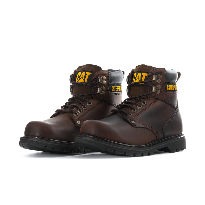 Pair of brown lace-up work boots with black padded collar, Caterpillar logos, thick soles