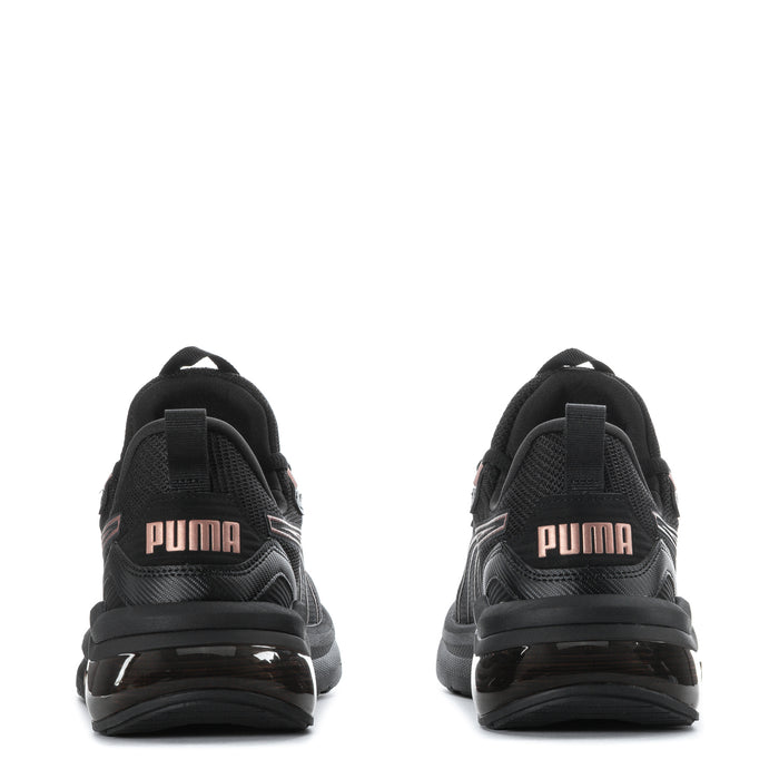Black women's sneakers heel back view with Puma text and cushioned sole