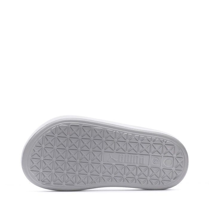 Youth slide sandal outsole in light gray with geometric tread pattern.