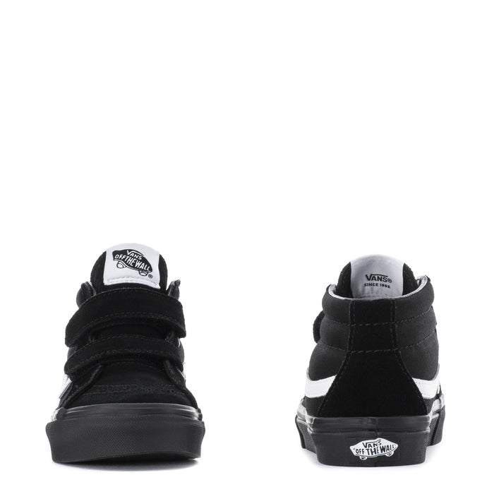 Kids' black mid-top skate shoes, rear view with heel logo and white side stripe