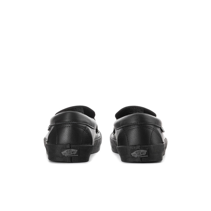 Men's black leather loafers, heel view with logo patch and side stitching