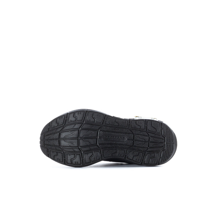 Kids sneaker outsole with deep tread for grip on dark rubber sole