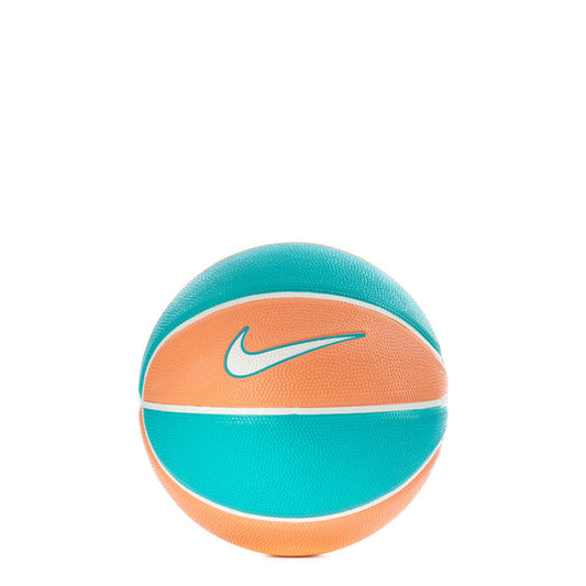 Mini basketball in teal and apricot with white stripe and Nike swoosh logo