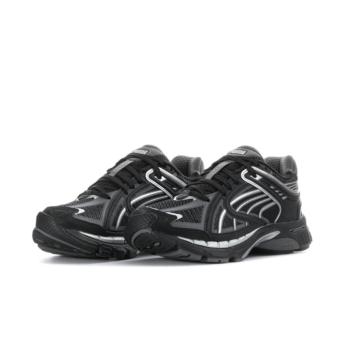 Women's black running shoes with silver accents, lace-up front and cushioned sole