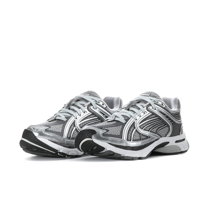 Women's PUMA running shoes, silver upper with black accents and white sole