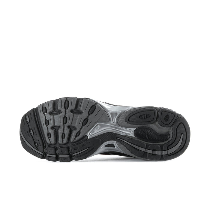 Women's black running shoe outsole with tread pattern and gray midfoot support