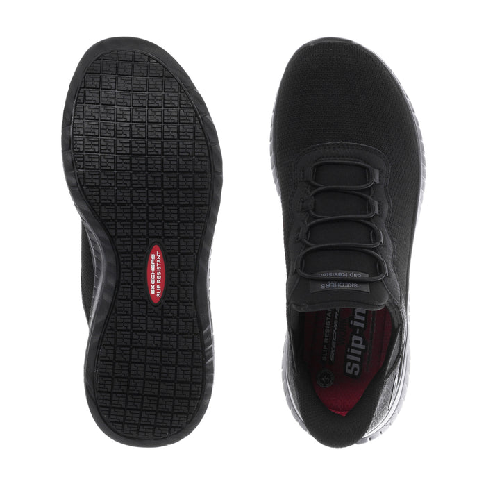 Black sneakers showing treaded outsole and padded collar at the lace-up opening