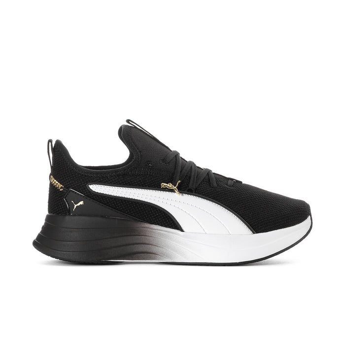 Black and white women's running sneakers with gold logo and white midsole
